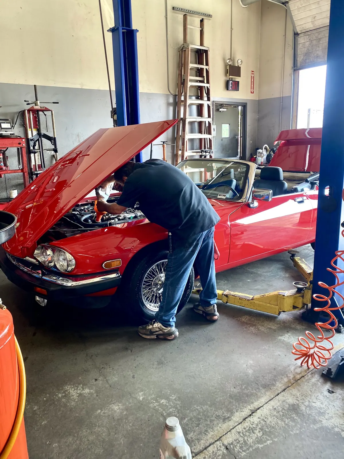 Technician working on a vehicle at Hazim Auto Service